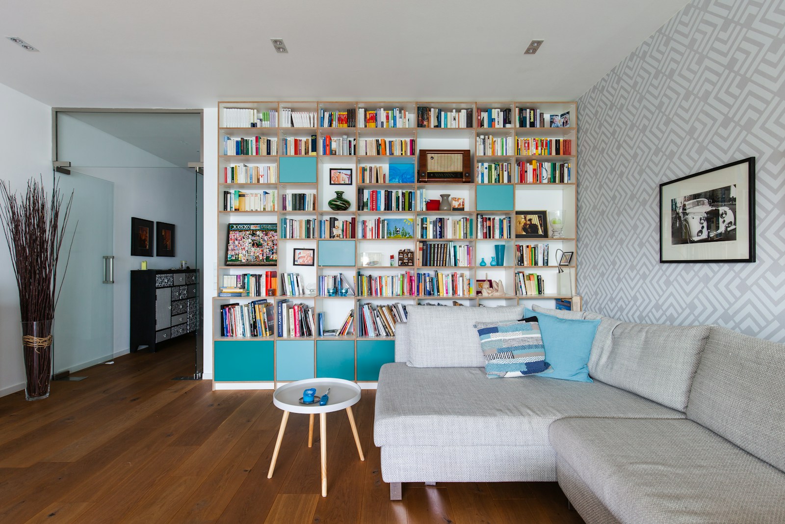 white wooden shelf with books